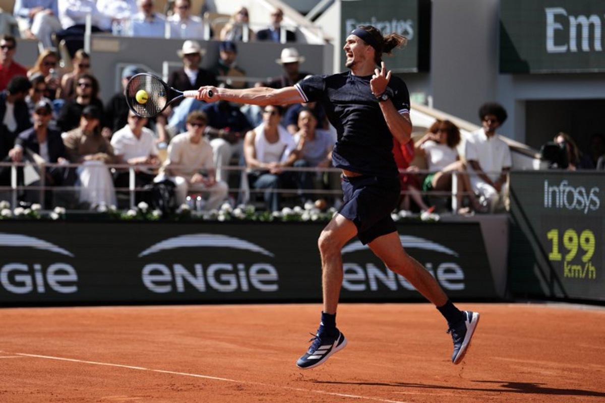 Germany's Alexander Zverev plays a forehand return to Italy's Flavio Cobolli during their mens final singles match on day 15 of the French Open tennis tournament on Court Philippe-Chatrier at the Roland-Garros Complex in Paris on June 7, 2026.  Dimitar DILKOFF / AFP