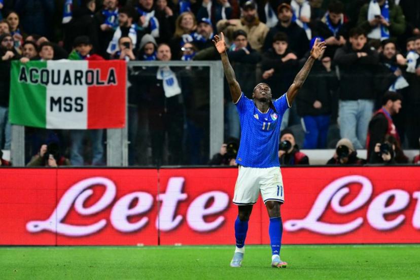 Italy's forward #11 Moise Kean celebrates after scoring his team's second goal during the play-off FIFA World Cup 2026 European qualification semi-final football match between Italy and North Ireland at the Gewiss stadium in Bergamo, on March 26, 2026.   Stefano RELLANDINI / AFP