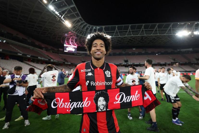 Nice's Brazilian defender #04 Dante celebrates after winning the L1-L2 playoff second-leg football match between first divison club OGC Nice and second division club AS Saint-Etienne at the Allianz Riviera Stadium in Nice, south-eastern France, on May 29, 2026.  Valery HACHE / AFP