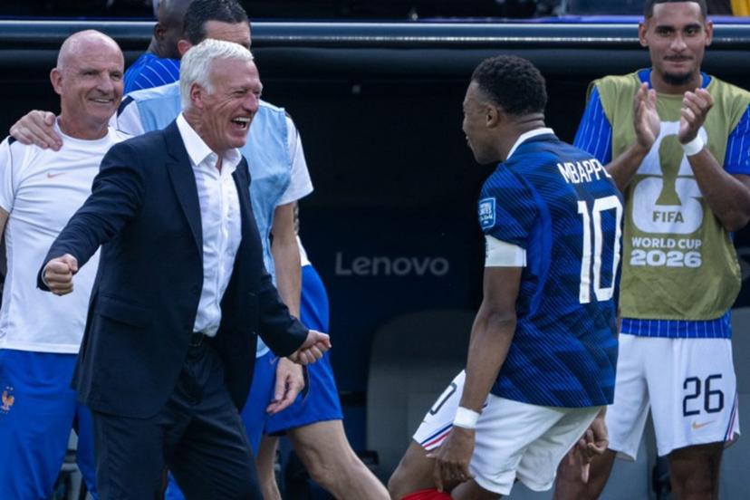 France's head coach Didier Deschamps celebrates with France's forward #10 Kylian Mbappe after he scored his team's first goal during the 2026 World Cup round of 32 football match between France and Sweden at the New York/New Jersey Stadium in East Rutherford on June 30, 2026.   Pedro UGARTE / AFP