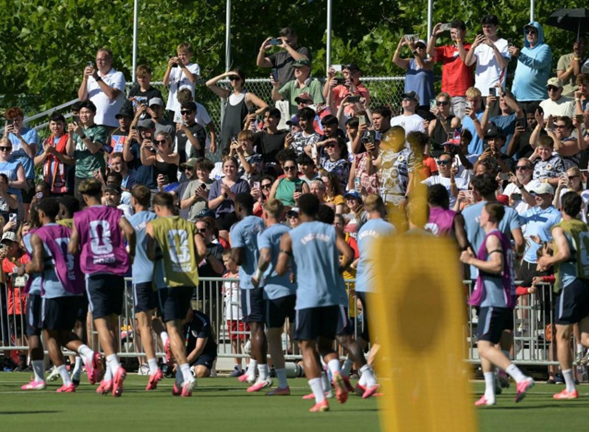 People attend an England training session ahead of their 2026 World Cup football tournament Group L football match against Croatia at Swope Soccer Village in Kansas City on June 13, 2026.   JUAN MABROMATA / AFP
