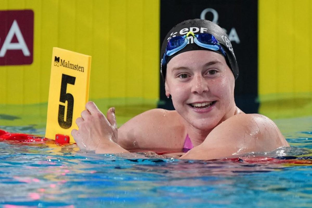 Belgium's Roos Vanotterdijk reacts after winning a semi-final of the women's 100m butterfly swimming event during the LEN European Aquatics Championships at the Olympic Aquatic Centre in Saint-Denis, northern suburbs of Paris, on August 13, 2026.  Dimitar DILKOFF / AFP