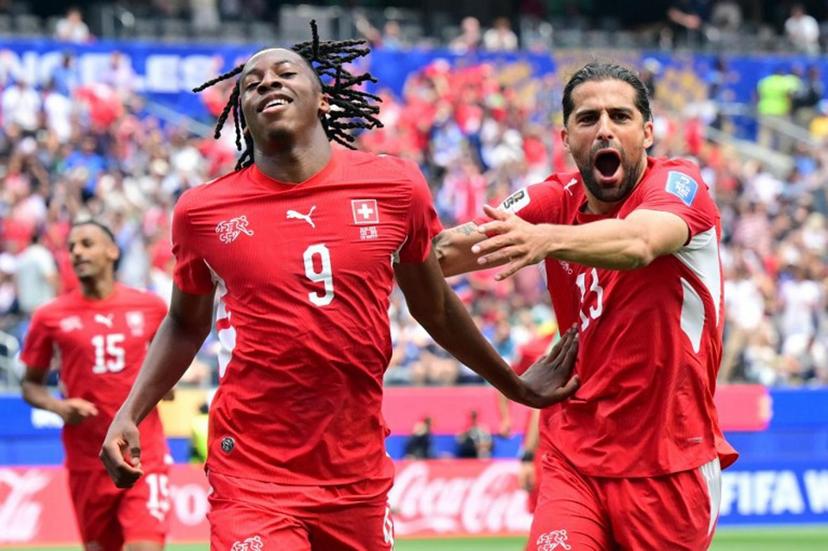 Switzerland's midfielder #09 Johan Manzambi celebrates scoring his team's third goal during the 2026 World Cup Group B football match between Switzerland and Bosnia and Herzegovina at Los Angeles Stadium in Inglewood on June 18, 2026.   Frederic J. Brown / AFP