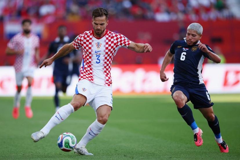 Croatia's defender #03 Marin Pongracic and Panama's midfielder #06 Cristian Martinez fight for the ball during the 2026 World Cup Group L football match between Panama and Croatia at the Toronto Stadium in Toronto on June 23, 2026.   Cole Burston / AFP