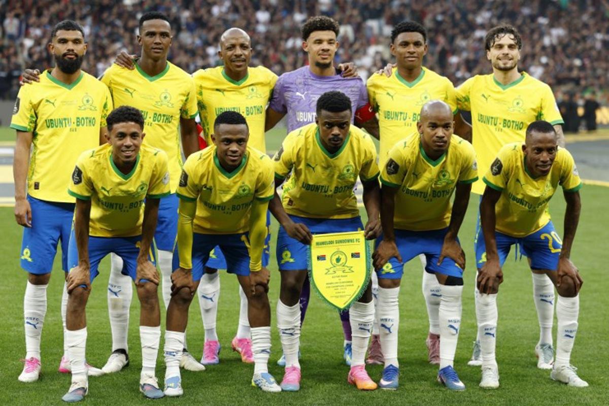 Mamelodi Sundowns' players pose for a group photo before the start of the CAF Champions League final football match between Mamelodi Sundowns and AS FAR at the Prince Moulay Abdellah Stadium in Rabat on May 24, 2026.  Abdel Majid BZIOUAT / AFP