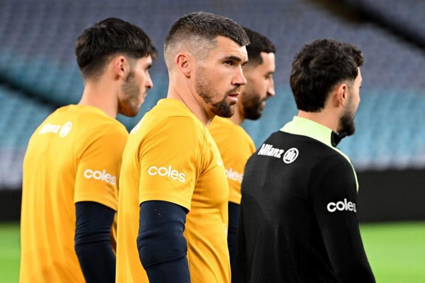Australia's goalkeeper Matthew Ryan walks onto the field during a training session at Accor Stadium in Sydney on March 26, 2026, ahead of their FIFA series 2026 football match against Cameroon.  SAEED KHAN / AFP