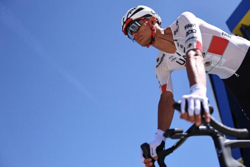 UAE Team Emirates XRG's Mexican rider Isaac Del Toro Romero awaits the start of the 7th stage of the Tour Auvergne-Rhone-Alpes cycling race (formerly known as the Criterium du Dauphine), 133,6km between La Bridoire and Grand Colombier in the French Alps on June 13, 2026.  Anne-Christine POUJOULAT / AFP