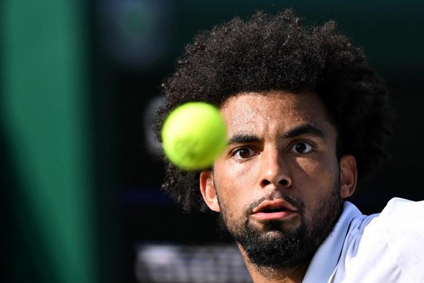 France's Arthur Fils focuses on the ball during their men's singles first round tennis match on the second day of the 2026 Wimbledon Championships at The All England Lawn Tennis and Croquet Club in Wimbledon, southwest London, on June 30, 2026.  Kirill KUDRYAVTSEV / AFP