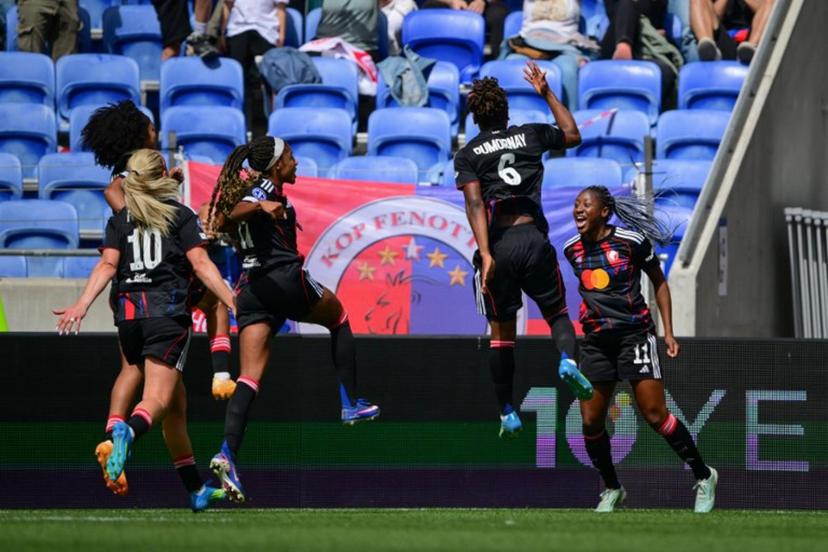 Lyonnes' players celebrate after scoring a goal during the women's UEFA Champions League second-leg semi-final football match between OL Lyonnes and Arsenal at the Groupama Stadium, in Decines-Charpieu, central-eastern France on May 2, 2026.  OLIVIER CHASSIGNOLE / AFP