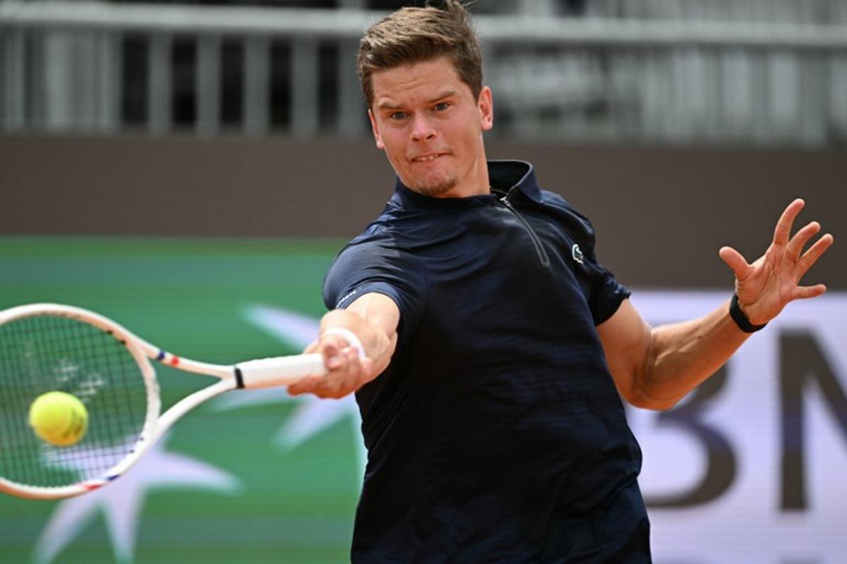 Belgium's Alexander Blockx returns the ball to Italy's Federico Cina during the ATP Rome Open tennis tournament at Foro Italico in Rome on May 7, 2026.   Tiziana FABI / AFP