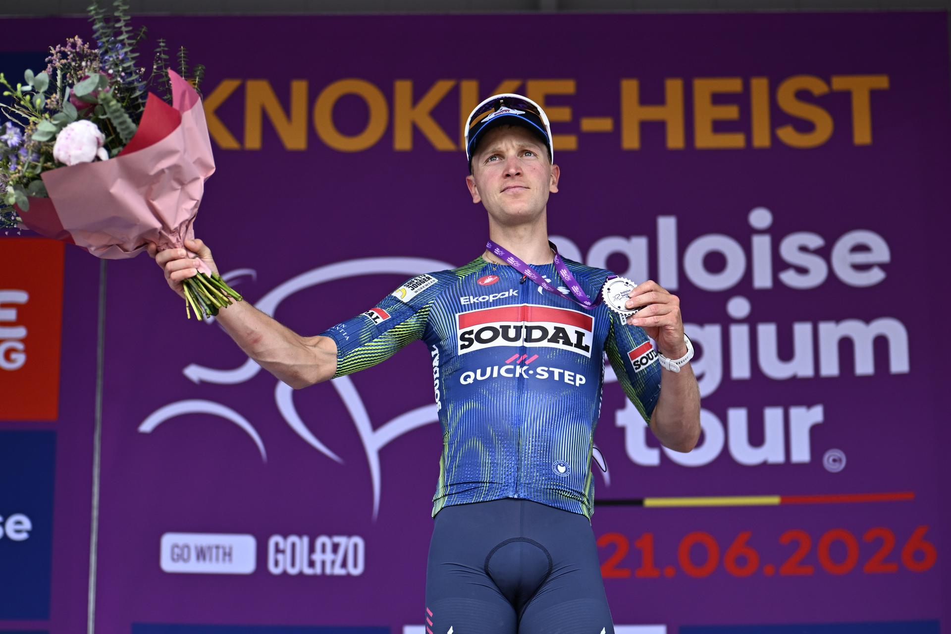 Belgian Tim Merlier of Soudal Quick-Step celebrates on the podium after winning stage 2 of the Baloise Belgium Tour cycling race, 197,6 km from Merelbeke-Melle to Knokke-Heist, Thursday 18 June 2026. The Baloise Belgium Tour takes place from 17 to 21 June. BELGA PHOTO JASPER JACOBS