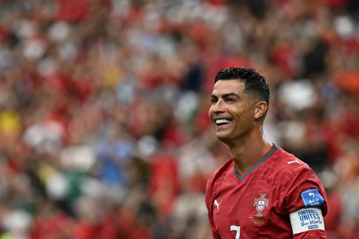 Portugal's forward #07 Cristiano Ronaldo reacts to his team's fourth goal during the 2026 World Cup Group K football match between Portugal and Uzbekistan at the Houston Stadium in Houston on June 23, 2026.   Paul ELLIS / AFP