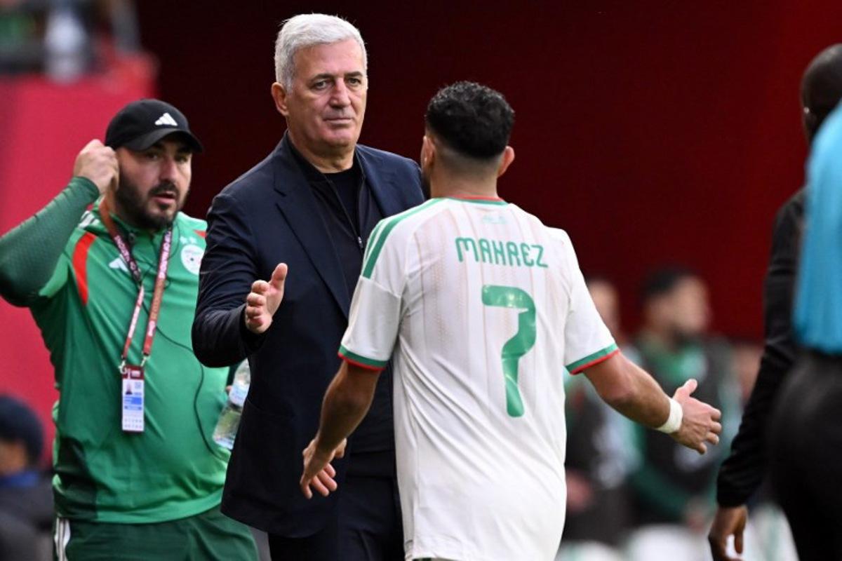Algeria's Bosnian head coach Vladimir Petkovic substitutes Algeria's forward #7 Riyad Mahrez during the Africa Cup of Nations (CAN) Group E football match between Algeria and Sudan at Moulay Hassan Stadium in Rabat on December 24, 2025.   SEBASTIEN BOZON / AFP