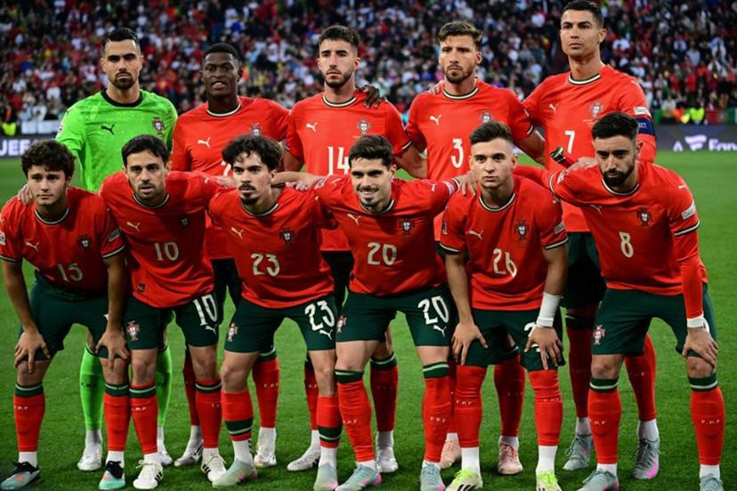 Portugal players pose for the team photo prior to the UEFA Nations League final football match between Portugal and Spain in Munich, southern Germany on June 8, 2025.  Tobias SCHWARZ / AFP