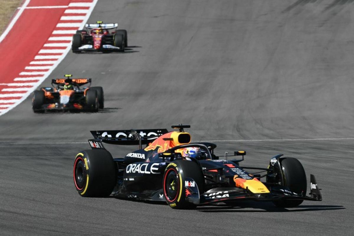 Red Bull Racing's Dutch driver Max Verstappen, winner of the pole position, leads the pack as the race begins during the United States Formula One Grand Prix at the Circuit of the Americas in Austin, Texas, on October 19, 2025.  RONALDO SCHEMIDT / AFP