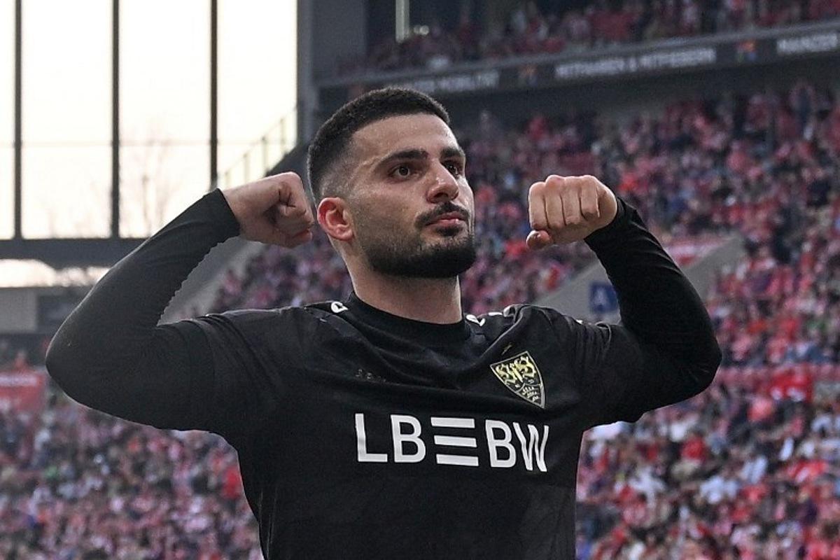 Stuttgart's German forward #26 Deniz Undav celebrates scoring the 1-2 goal with his teammates during the German first division Bundesliga football match between 1 FSV Mainz 05 and VfB Stuttgart in Mainz, western Germany on March 7, 2026.  Kirill KUDRYAVTSEV / AFP