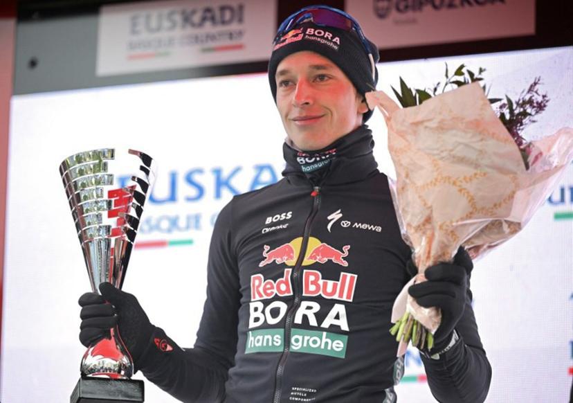 Second placed Team Bora's German rider Florian Lipowitz celebrates on the podium of the 2026 Basque Country's Itzulia cycling tour after the sixth and last stage, in Bergara, on April 11, 2026.   ANDER GILLENEA / AFP