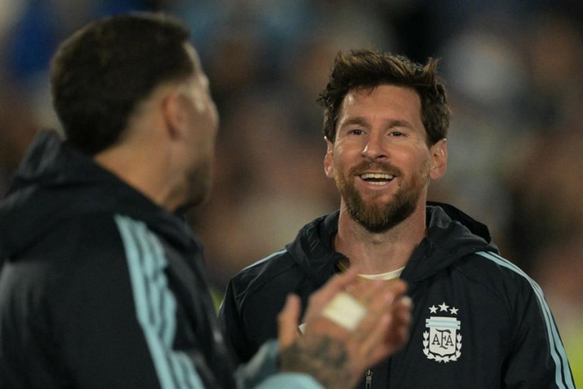 Argentina's forward #10 Lionel Messi shares a light moment with his teammates following the international friendly football match between Argentina and Benin at the Mas Monumental stadium in Buenos Aires on October 6, 2026.  JUAN MABROMATA / AFP