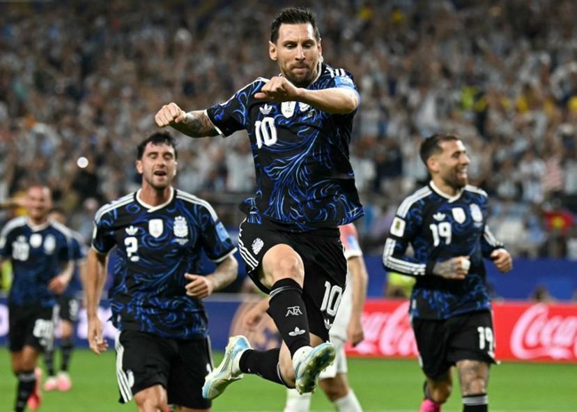Argentina's forward #10 Lionel Messi celebrates scoring his team's third goal during the 2026 World Cup Group J football match between Jordan and Argentina at the Dallas Stadium in Arlington on June 27, 2026.   Paul ELLIS / AFP