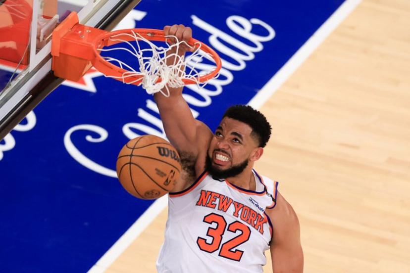 Knicks' center #32 Karl-Anthony Towns reacts after a dunk during Game Five of the Eastern Conference Finals of the 2025 NBA Playoffs between the New York Knicks and the Indiana Pacers at Madison Square Garden in New York on May 29, 2025.  CHARLY TRIBALLEAU / AFP