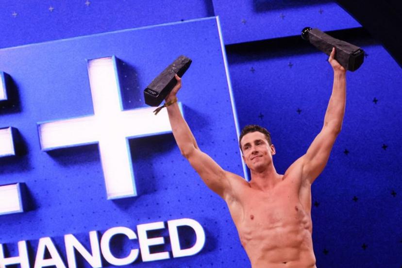 Greek swimmer Kristian Gkolomeev celebrates his wins during the medal ceremony following the Enhanced Games at Resorts World Las Vegas in Las Vegas, Nevada, on May 24, 2026. The first-ever Enhanced Games -- widely dubbed the "Steroid Olympics" -- take place Sunday in Las Vegas, where elite sprinters, swimmers and weightlifters will vie for world records while taking banned performance-enhancing drugs. ETIENNE LAURENT / AFP