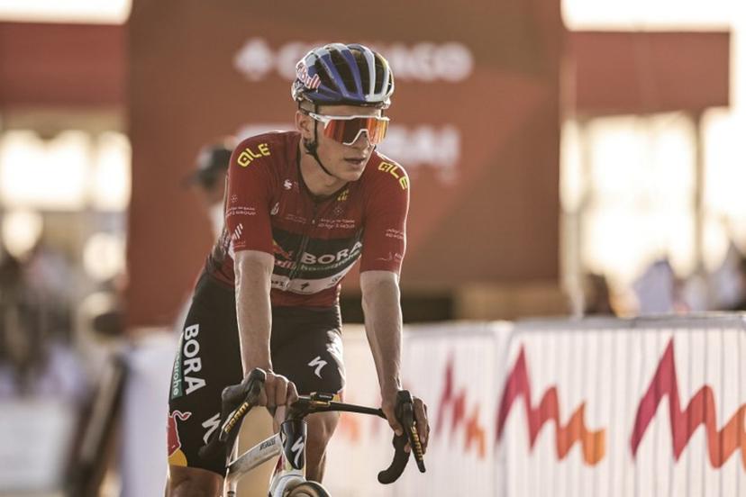 Red Bull-Bora-Hansgrohe's Belgian rider Remco Evenepoel crosses the finish line during the third stage of the UAE Tour cycling event from Umm al-Quwain to Jebel Mobrah in Ras al-Khaimah on February 18, 2026.  Fadel SENNA / AFP