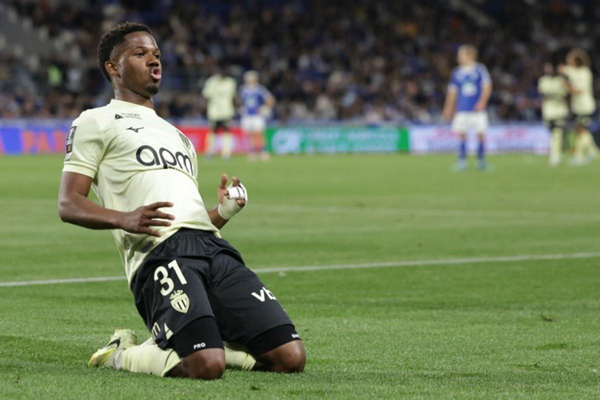 Monaco's Spanish forward #31 Ansu Fati celebrates scoring his team's third goal  during the French L1 football match between RC Strasbourg Alsace and AS Monaco at the Stade de la Meinau in Strasbourg, eastern France, on May 17, 2026.   ROMEO BOETZLE / AFP