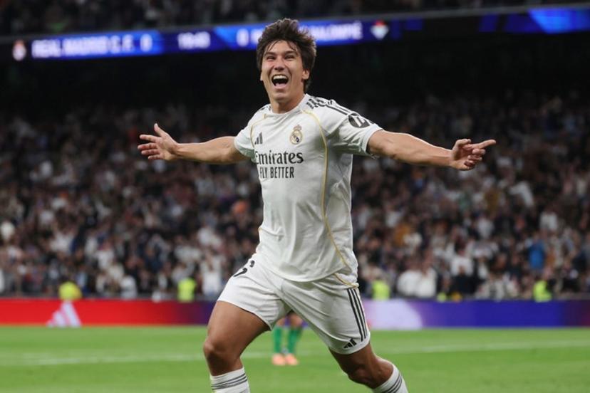 Real Madrid's Spanish forward #16 Gonzalo Garcia celebrates scoring the opening goal during the Spanish League football match between Real Madrid CF and Real Betis at Santiago Bernabeu Stadium in Madrid on January 4, 2026.  Pierre-Philippe MARCOU / AFP
