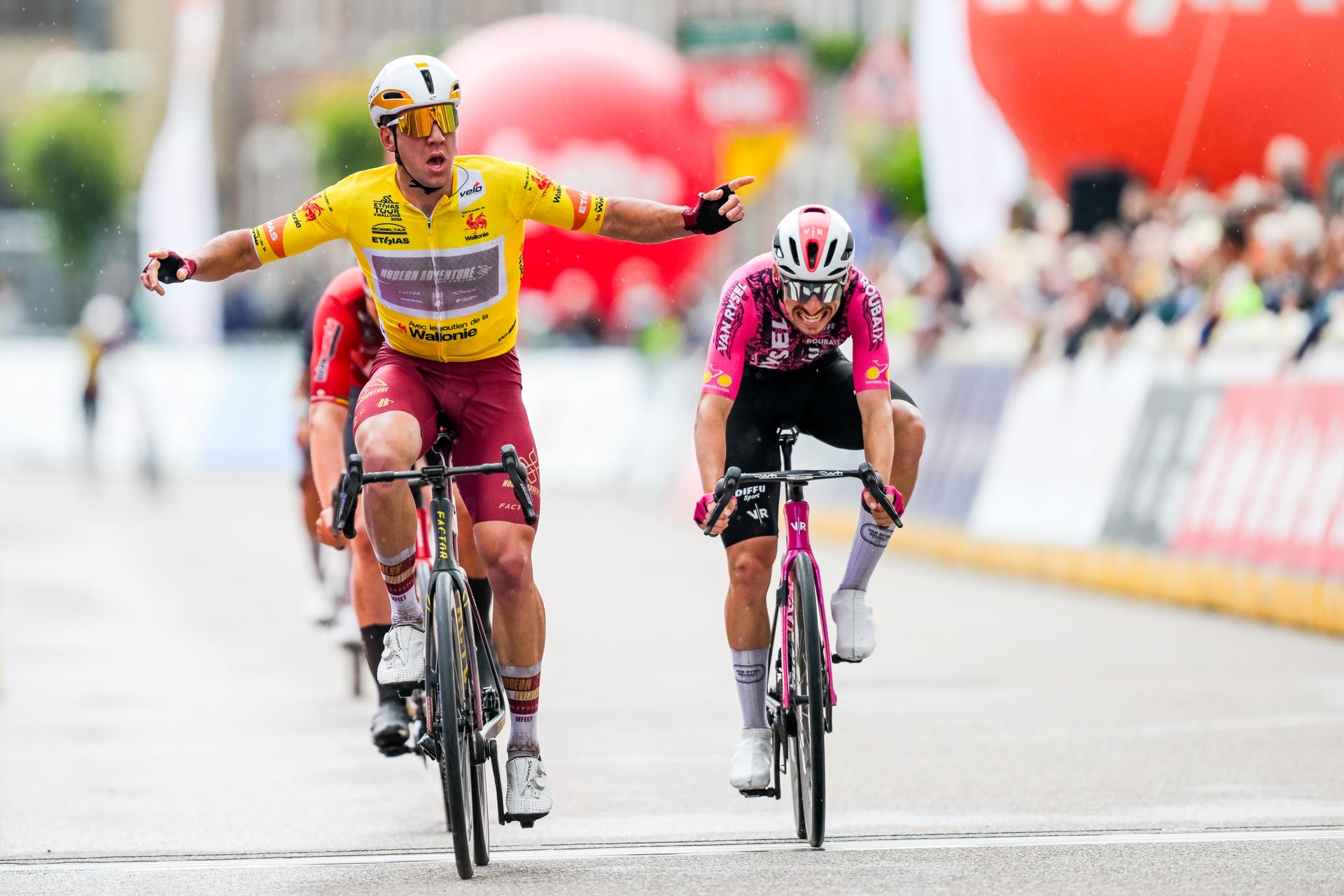 New Zealander Ben Oliver of Modern Adventure Pro Cycling celebrates as he crosses the finish line to win the fifth stage of the Tour De Wallonie cycling race, from Bassenge to Aubel (176,4 km), on Friday 05 June 2026. BELGA PHOTO DAVID PINTENS
