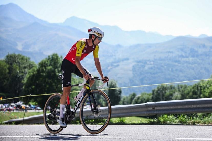 Cofidis team's German rider Emanuel Buchmann cycles during the 13th stage of the 112th edition of the Tour de France cycling race, 10.9 km individual time trial  between Loudenvielle and Peyragudes, in the Pyrenees mountains of southwestern France, on July 18, 2025.  Anne-Christine POUJOULAT / AFP