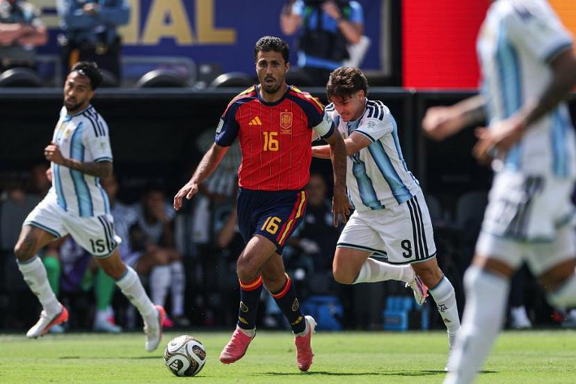 Spain's midfielder #16 Rodri and Argentina's forward #09 Julian Alvarez fight for the ball during the 2026 World Cup football tournament final match between Spain and Argentina at the New York/New Jersey Stadium in East Rutherford on July 19, 2026.   PATRICIA DE MELO MOREIRA / AFP