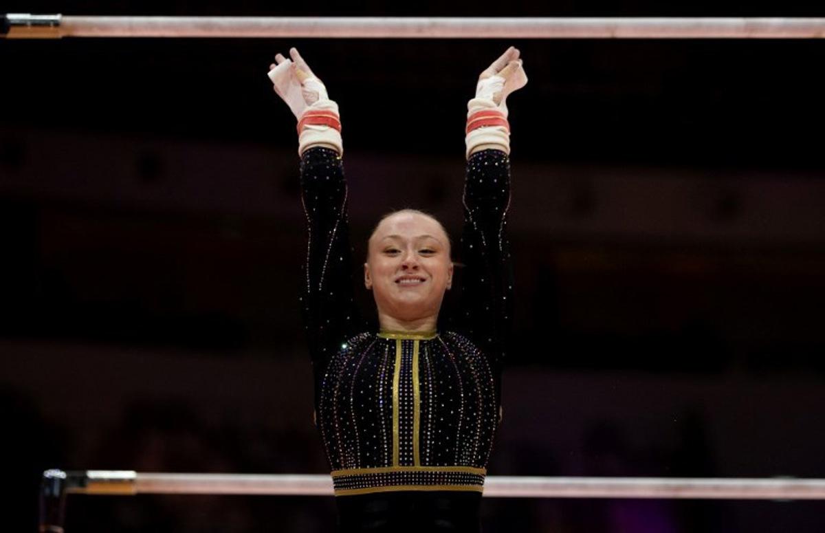 Belgium's Lisa Vaelen competes on the uneven bars during the women's qualifying session at the 53rd FIG Artistic Gymnastics World Championships in Jakarta on October 21, 2025.  Yasuyoshi CHIBA / AFP