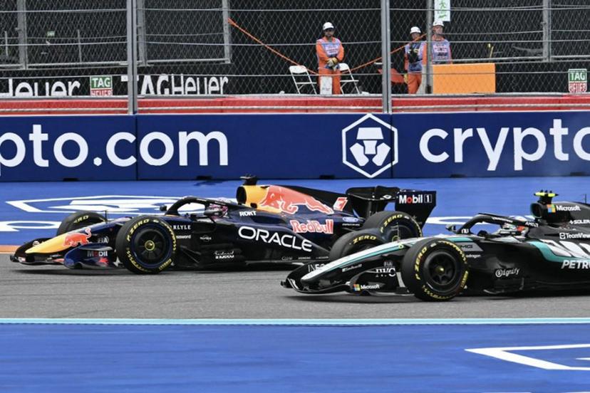 (L/R) Red Bull Racing's Dutch driver Max Verstappen and Mercedes' Italian driver Kimi Antonelli race during the 2026 Miami Formula One Grand Prix at Miami International Autodrome in Miami Gardens, Florida, on May 3, 2026.   CHANDAN KHANNA / AFP