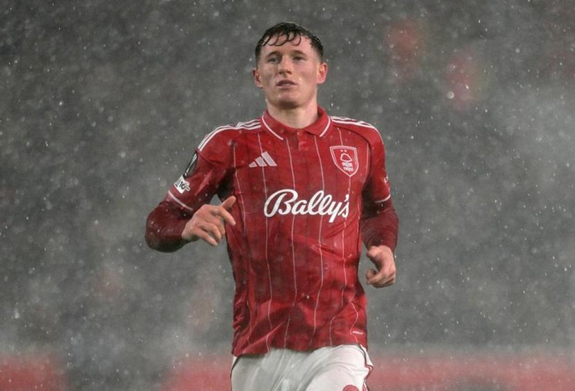 Nottingham Forest's English midfielder #08 Elliot Anderson runs in the rain during the UEFA Europa League round of 16, first leg football match between Nottingham Forest and FC Midtjylland at The City Ground in Nottingham, central England, on March 12, 2026.  Oli SCARFF / AFP