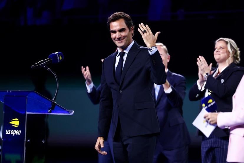 Swiss former tennis player Roger Federer wears his official International Tennis Hall of Fame ring after receiving it on the court at Arthur Ashe Stadium on day two of the US Open tennis tournament at the USTA Billie Jean King National Tennis Center in New York City on August 31, 2026.  CHARLY TRIBALLEAU / AFP