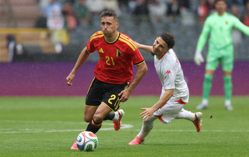 Belgium's Timothy Castagne and Tunisian Ismael Gharbi fight for the ball during a friendly soccer game between Belgian national team Red Devils and Tunisia, Saturday 06 June 2026 in Brussels, part of the preparations for the 2026 FIFA World Cup. BELGA PHOTO VIRGINIE LEFOUR