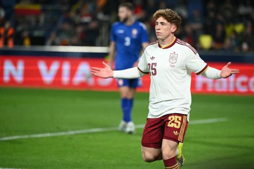 Spain's forward #25 Victor Munoz Villanueva celebrates scoring his team's third goal during the international friendly football match between Spain and Serbia at La Ceramica Stadium in Vila-real on March 27, 2026.  JOSE JORDAN / AFP