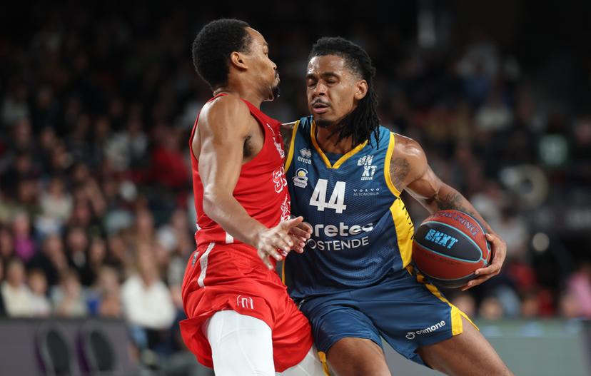 Spirou's Nigel Hawkins and Oostende's Adam Miller fight for the ball during a basketball match between Spirou Charleroi and BC Oostende, Friday 23 October 2026 in Charleroi, on day 4 of the 'BNXT League' Belgian and Dutch first division basket championship. BELGA PHOTO VIRGINIE LEFOUR