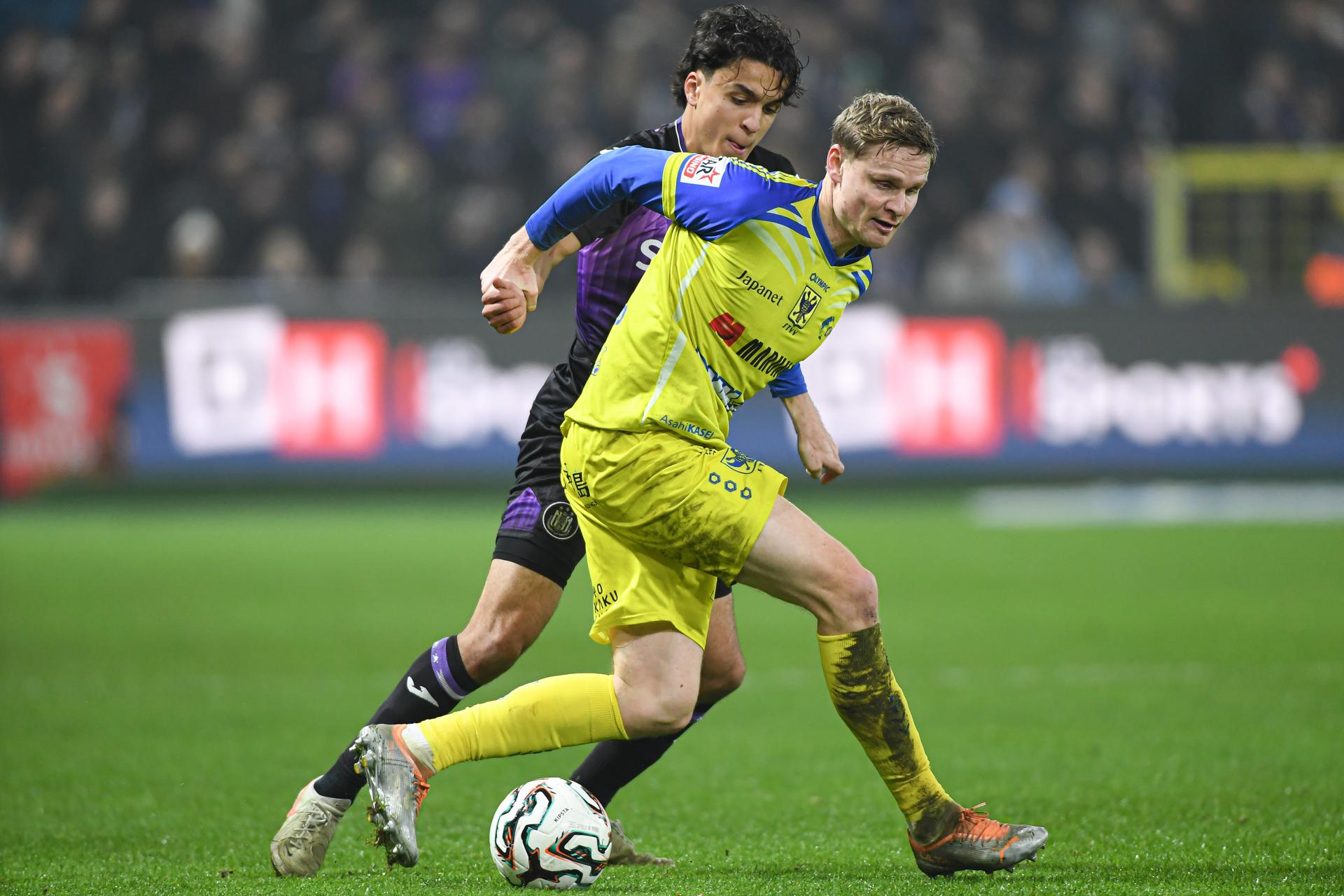 Anderlecht's Ali Maamar and STVV's Simen Juklerod pictured in action during a soccer match between RSC Anderlecht and Sint-Truidense V.V., Saturday 13 December 2025 in Brussels, on day 18 of the 2025-2026 'Jupiler Pro League' first division of the Belgian championship. BELGA PHOTO JILL DELSAUX