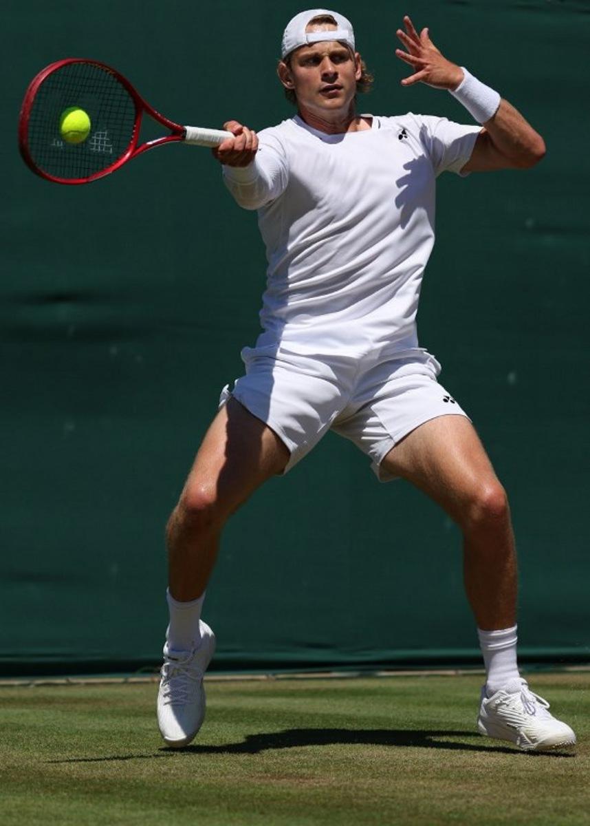 Belgium's Zizou Bergs returns against Portugal's Jaime Faria during their men's singles second round tennis match on the fourth day of the 2026 Wimbledon Championships at The All England Lawn Tennis and Croquet Club in Wimbledon, southwest London, on July 2, 2026.  Adrian Dennis / AFP