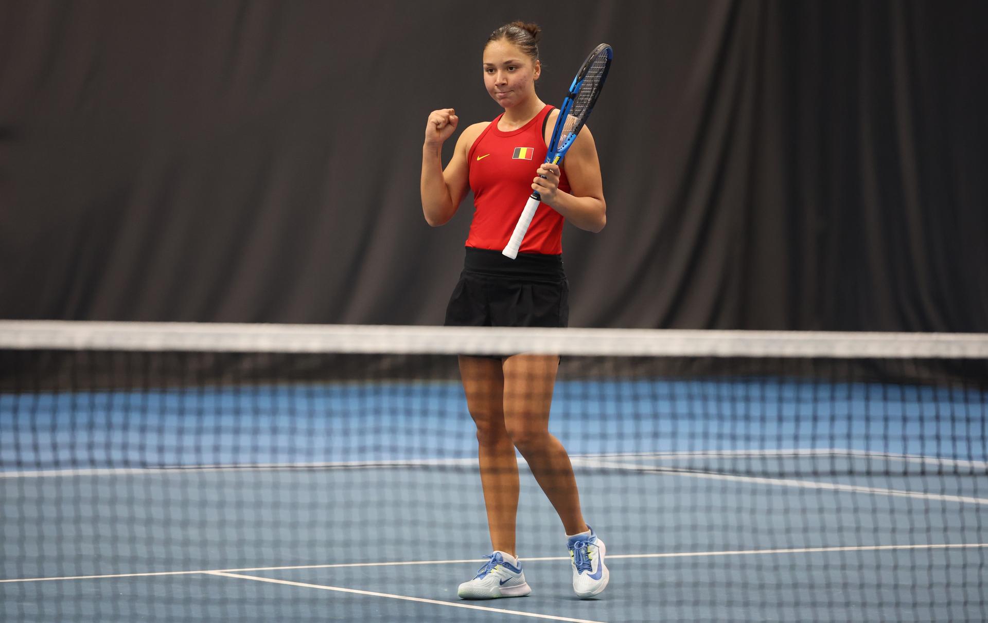 Belgian Sofia Costoulas celebrates after winning a tennis match between Belgian Costoulas and Hungarian Toth, in the meeting between Belgium and Hungary in the pool phase of the Europe/Africa Group I of the Billie Jean King Cup tennis, in Vilnius, Lithuania on Wednesday 09 April 2025. PHOTO VIRGINIE LEFOUR PHOTO VIRGINIE LEFOUR