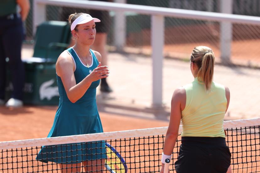 Belgian Elise Mertens and Polish Maja Chwalinska shake hands after their tennis match, in the second round of the women's singles at the Roland Garros French Open tennis tournament, in Paris, France, Thursday 28 May 2026. This year's tournament takes place from 18 May to 07 June. BELGA PHOTO VIRGINIE LEFOUR