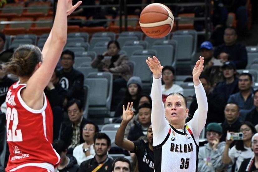 Belgium´s Julie Vanloo (R) shoots under the pressure of Czech Republic´s Emma Cechova during the FIBA Women's Basketball World Cup 2026 qualifying tournament game between Belgium and Czech Republic in Wuhan, in China's central Hubei province on March 17, 2026.  CN-STR / AFP