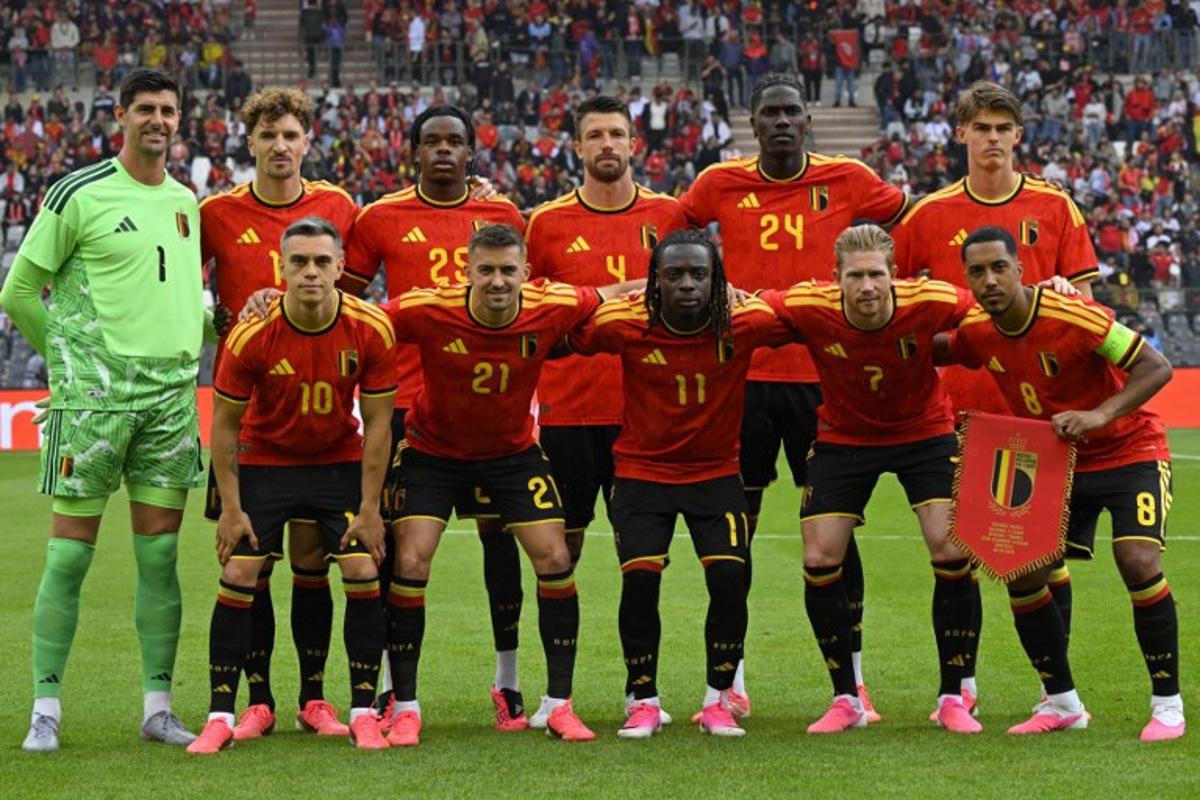 (LtoR) Belgium's goalkeeper #1 Thibaut Courtois, Belgium's defender #12 Thomas Meunier, Belgium's midfielder #10 Leandro Trossard, Belgium's defender #3 Nathan Ngoy, Belgium's defender #21 Timothy Castagne, Belgium's defender #4 Brandon Mechele, Belgium's midfielder #11 Jeremy Doku, Belgium's midfielder #18 Amadou Onana, Belgium's midfielder #7 Kevin De Bruyne, Belgium's midfielder #8 Youri Tielemans and Belgium's forward #17 Charles De Ketelaere pose ahead of the international friendly football match between Belgium and Tunisia at the King Baudouin Stadium in Brussels on June 6, 2026.  JOHN THYS / AFP
