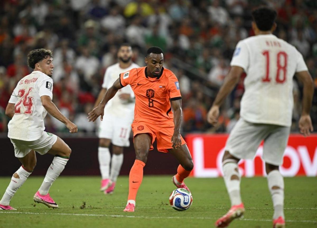 Morocco's midfielder #24 Neil El Aynaoui and Netherlands' midfielder #08 Ryan Gravenberch fight for the ball during the 2026 World Cup round of 32 football match between the Netherlands and Morocco at the Monterrey Stadium in Guadalupe on June 29, 2026.   Alfredo ESTRELLA / AFP