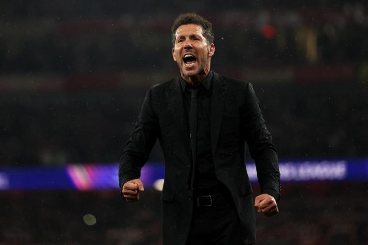 Atletico Madrid's Argentinian coach Diego Simeone reacts with the fans following the UEFA Champions League second-leg semi-final football match between Arsenal and Atletico Madrid at the Emirates Stadium in north London on May 5, 2026.  Adrian Dennis / AFP
