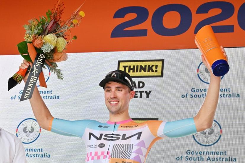 NSN Cycling Team's British rider Ethan Vernon celebrates at the podium after winning stage four of the Tour Down Under UCI men's cycling race in Adelaide on January 24, 2026.   Brenton Edwards / AFP