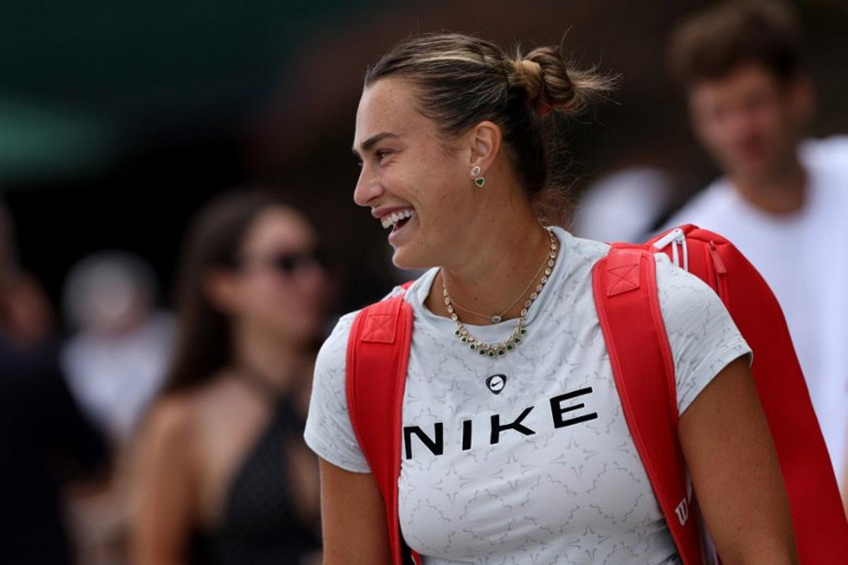 Belarus's Aryna Sabalenka arrives at the practice courts at The All England Lawn Tennis and Croquet Club in Wimbledon, southwest London, on June 28, 2026, ahead of the 2026 Wimbledon Championships.  Adrian Dennis / AFP