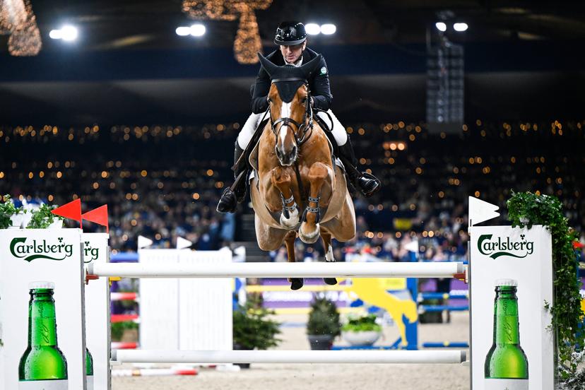Belgian rider Koen Vereecke with Merryweather Vt Leeuwerikenhof pictured in action during the FEI World Cup Jumping competition at the 'Vlaanderens Kerstjumping - Memorial Eric Wauters' equestrian event in Mechelen on Monday 30 December 2024. BELGA PHOTO TOM GOYVAERTS