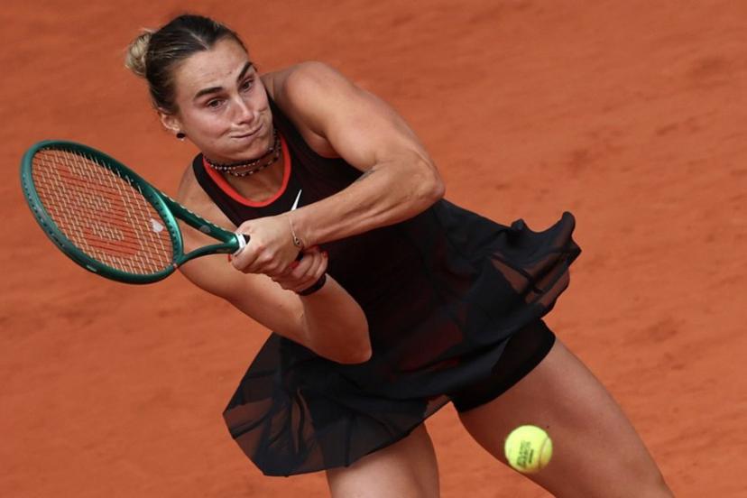 Aryna Sabalenka plays a backhand return to Diana Shnaider during their women's quarter final singles match on day 11 of the French Open tennis tournament on Court Philippe-Chatrier at the Roland-Garros Complex in Paris on June 3, 2026.  Anne-Christine POUJOULAT / AFP